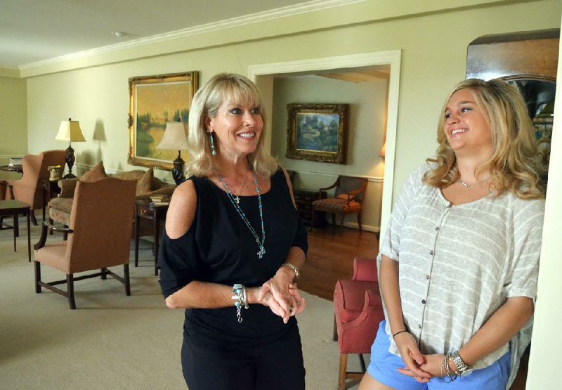 Arkansas Democrat-Gazette/MICHAEL WOODS  --05/04/2012--  University of Arkansas junior Shelby Mohs and University alum Susan Burckart talk about the planned expansion of the Kappa Kappa Gamma sorority house Friday morning on the University of Arkansas campus.