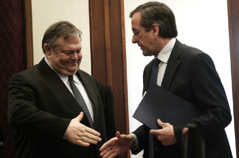 Greek Socialist party leader Evangelos Venizelos (left) ends a meeting Friday in Athens with New Democracy party leader Antonis Samaras as efforts to form a government continued in vain. 
