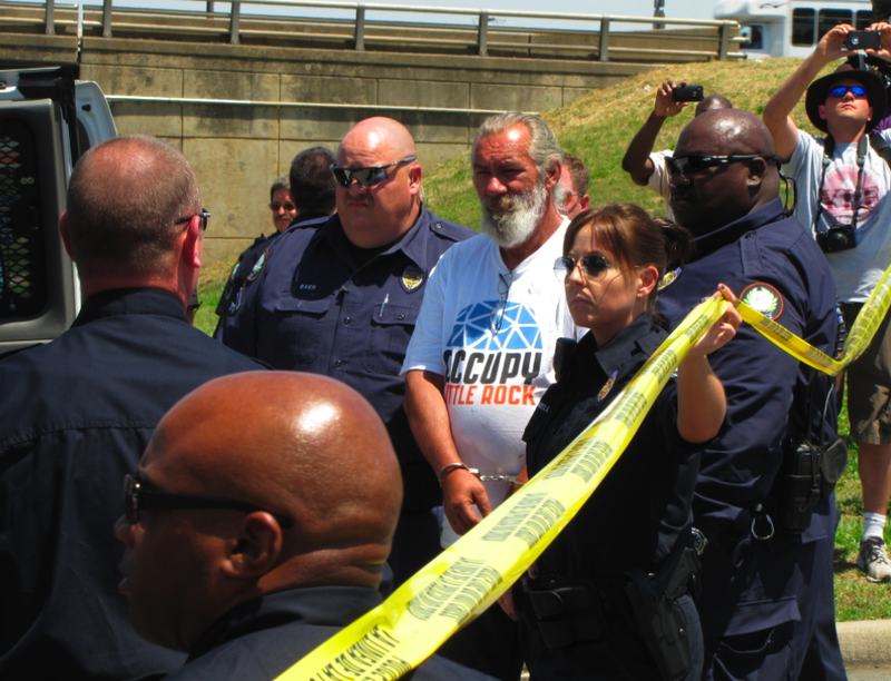 Police arrest Occupy Little Rock protester Greg Deckelman Wednesday afternoon, May 16, 2012.