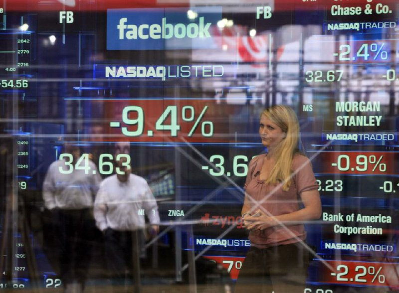 Television correspondent Sabrina Quagliozzi reports from inside the Nasdaq MarketSite in New York’s Times Square on Monday as Facebook’s stock tumbled in its second day of trading. 