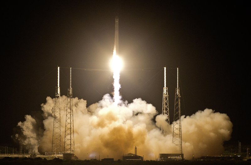 The Falcon 9 SpaceX rocket lifts off from space launch complex 40 at the Cape Canaveral Air Force Station in Cape Canaveral, Fla., early Tuesday, May 22, 2012. This launch marks the first time, a private company sends its own rocket to deliver supplies to the International Space Station.