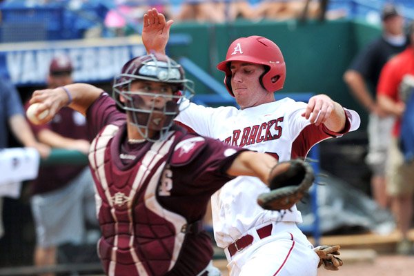 Mississippi State catcher Mitch Slauter forces out a sliding Matt Vinson at the plate, then throws to first to complete a double play on Brian Anderson, who had grounded to pitcher Brandon Woodruff during Tuesday’s game. 