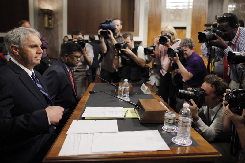 U.S. Secret Service Director Mark Sullivan,left, and Department of Homeland Security's acting Inspector General Charles K. Edwards, prepare to testify on Capitol Hill in Washington, Wednesday, May 23, 2012, before the Senate Homeland Security and Governmental Affairs Committee.
