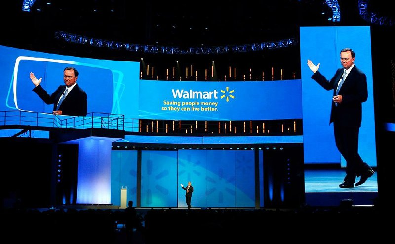 Michael Duke, president and chief executive officer of Wal-Mart Stores Inc., speaks during the company’s 2011 annual meeting at Bud Walton Arena in Fayetteville. 