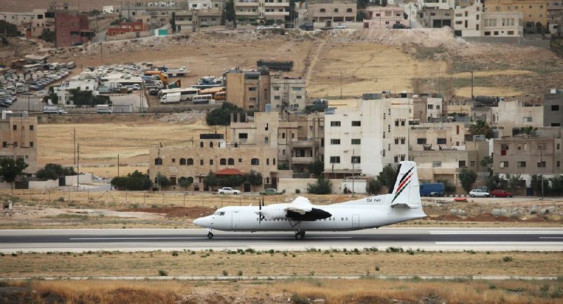 A Palestinian Airlines flight takes off from Marka Airbase in Amman, Jordan, for El-Arish, Egypt, on Sunday. 