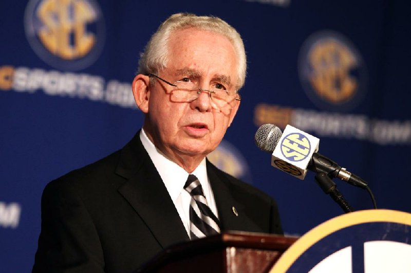 Southeastern Conference commissioner Mike Slive talks to media during the SEC Media Days on Wednesday, July 21, 2010, in Hoover, Ala. (AP Photo/ Butch Dill)