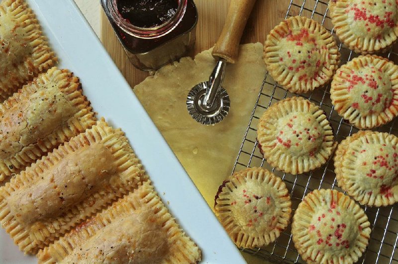 Toaster pastries, made with homemade or store-bought pie crust, can be savory, such as these filled with mozzarella cheese and tomato sauce (left), or sweet, such as these filled with berry jam. 