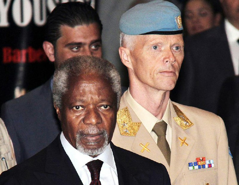 Kofi Annan (left front), U.N.-Arab League joint special envoy for Syria, and Norwegian Maj. Gen. Robert Mood, head of the U.N. observer team in Syria, attend a news conference Monday in Damascus. 