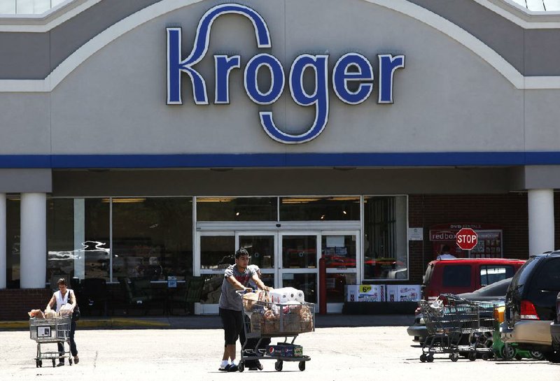 This Tuesday, June 12, 2012, photo shows a Kroger grocery store in Dearborn, Mich. (AP Photo/Paul Sancya)