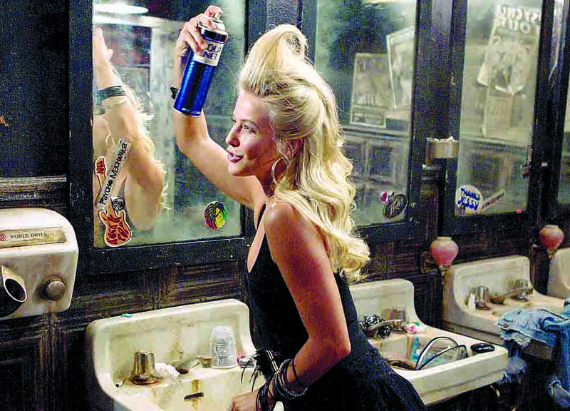 Would-be rock singer Sherrie Christian (Julianne Hough) teases it up in Adam Shankman’s Rock of Ages. 