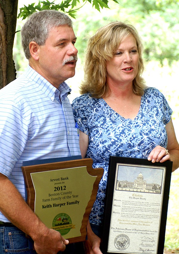 "Surprised" is how Keith and Georgia Harper described their reaction to the news they had been selected Benton County Farm Family of the Year. The Harpers intentionally limited their chickengrowing operation to two houses to give them more time for their family and community. In addition to raising their three daughters, Keith is an elder and lay preacher at the Church of Christ in Springtown. Georgia spends much time as a 4-H leader and gardening mentor for the Bloomfield 4-H Club.