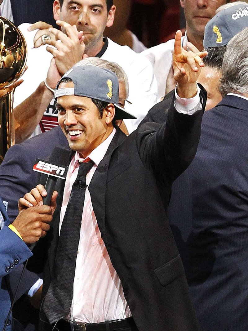 Miami Coach Erik Spoelstra says the Heat’s loss to the Dallas Mavericks in the 2001 NBA Finals taught them plenty and served as motivation this season. 