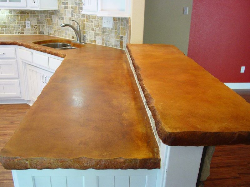 Concrete countertops can have jagged edges designed to emulate rock and stone or can be smooth, sleek and modern.

