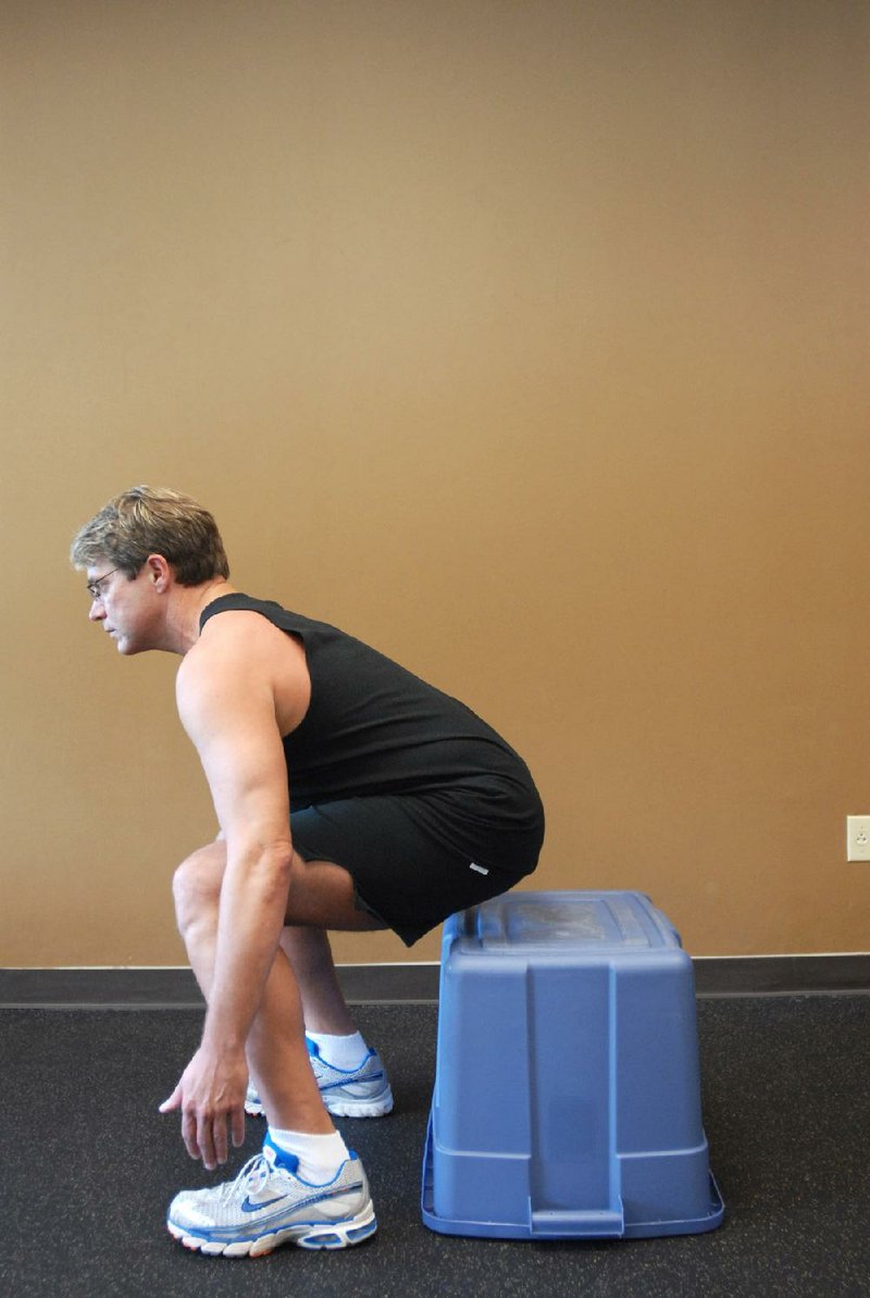 Yancy Prosser demonstrates a 90-degree squat in this photo taken in 2008. 