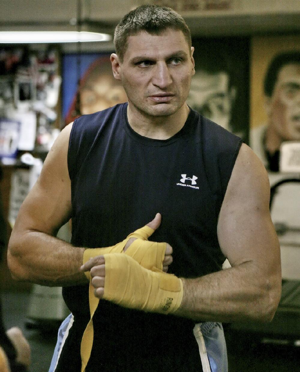 FILE - In this Jan. 16, 2008 file photo, boxer Andrew Golota prepares for a workout at Kingsway Gym in New York. On Monday, June 25, 2012, the Chicago Tribune reported that Golota, now retired, could be deported from the United States to his native Poland. Golota lives in Chicago as a legal permanent resident of the U.S., but a criminal background check was triggered when he filed paperwork to become a U.S. citizen. Golota pleaded guilty in two, separate Illinois cases over the past decade. His wife, Mariola Golota, says a decision is expected in September. (AP Photo/Bebeto Matthews, File)