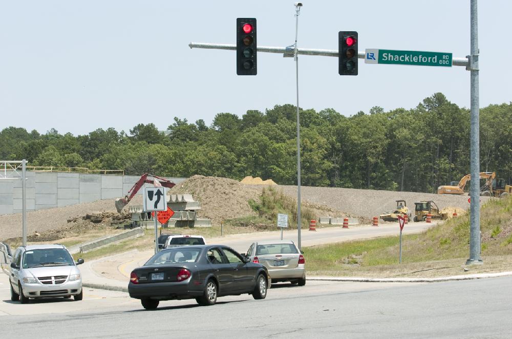 Arkansas Democrat-Gazette/KAREN E. SEGRAVE --6/25/12-- Motorists turns onto the I-430 Southbound on-ramp at the intersection of Shackleford and Hermitage on Monday afternoon. The on-ramp will be closed on Wednesday for road work improvements.