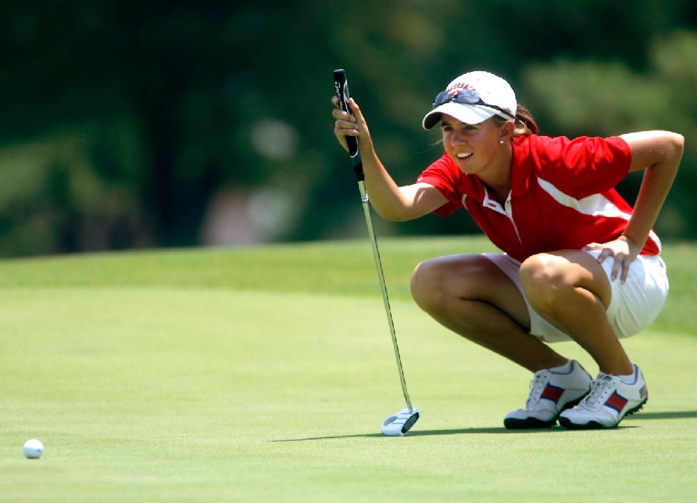 Arkansas Democrat-Gazette/JASON IVESTER --06/25/12--
Summer Roachell lines up her putt on the first green at Pinnacle Country Club in Rogers on Monday, June 25, 2012, during the qualifying round for the Wal-Mart NW Arkansas Championship.