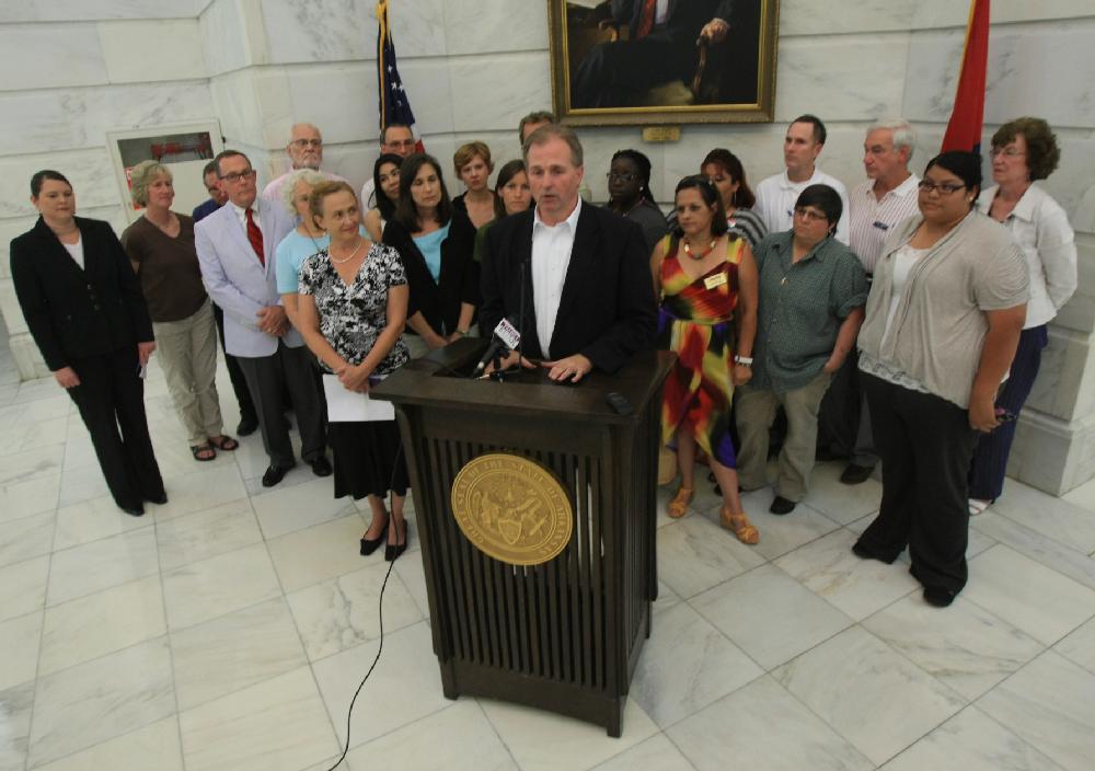 Arkansas Democrat-Gazette/ STATON BREIDENTHAL --6/25/12-- Rev. Stephen Copley, Chairman of the Arkansas Interfaith Alliance, speaks Monday during a press conference at the state Capitol about the U.S. Supreme Court decision on Arizona's immigration law.