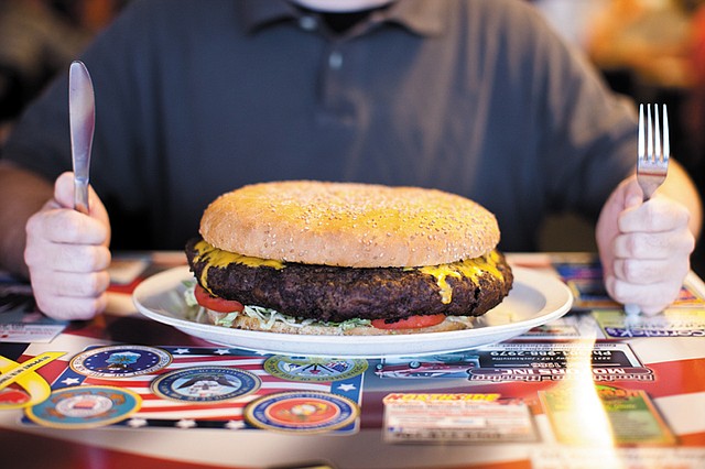 The gargantuan Sarge Burger of Pig’n-Chik Barbecue in Sherwood is four pounds of meat and a full pound of bun, dressed to your preference. If someone can consume the whole thing in less than 30 minutes, the $25 burger is on the house.