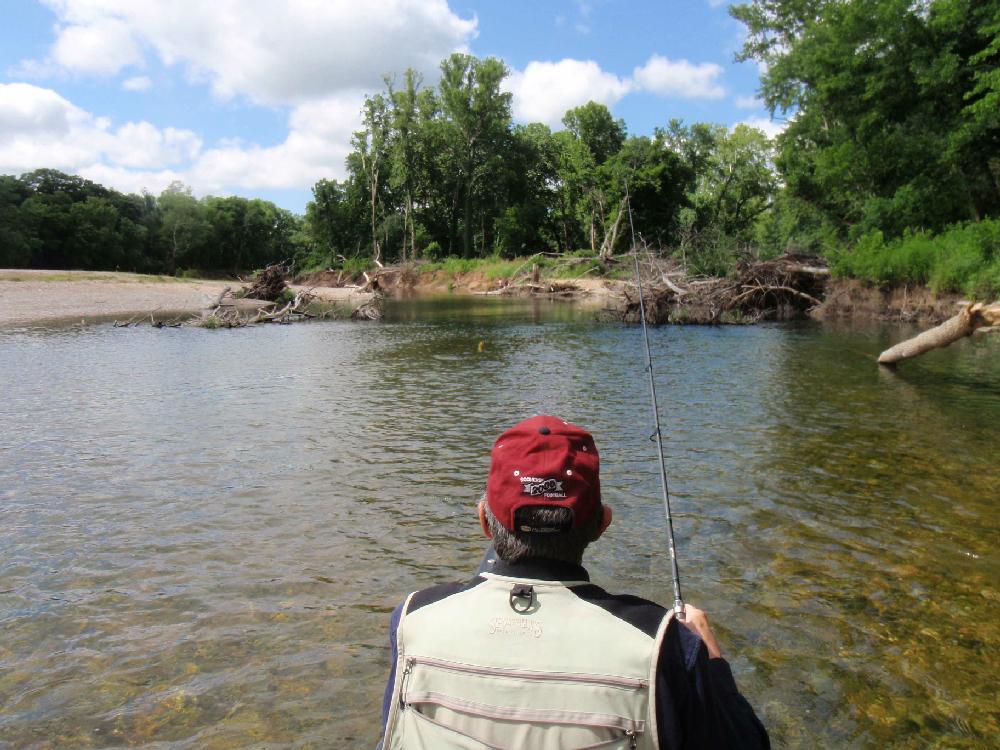 Clean water and cover for fish in the form of timber and boulders make the Elk River a fine fishing stream.