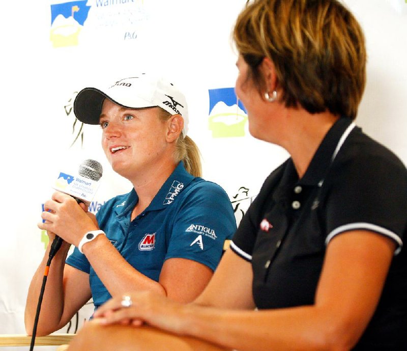 
Stacy Lewis (left) and University of Arkansas head coach Shauna Estes-Taylor speak during a news conference at Pinnacle Country Club in Rogers during the pro-am on Wednesday, June 27, 2012, as part of the Wal-Mart NW Arkansas Championship.
