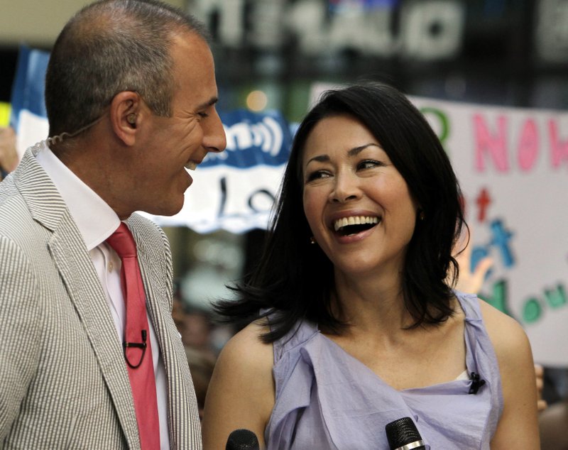 FILE - In this July 22, 2011 file photo, NBC "Today" television program co-hosts Matt Lauer and Ann Curry appear during a segment of the show in New York. 