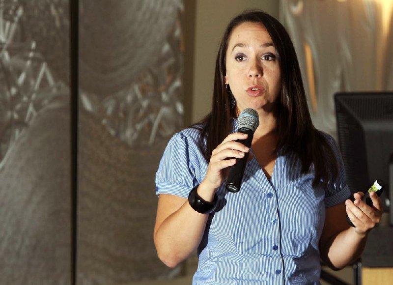 Arkansas Democrat-Gazette/DAVID GOTTSCHALK

Elizabeth Scaife, program associate with Shared Hope International, speaks Thursday afternoon at Arkansas' first Legislative Summit on Human Trafficking at the Northwest Arkansas Community College in Bentonville.

6/28/12