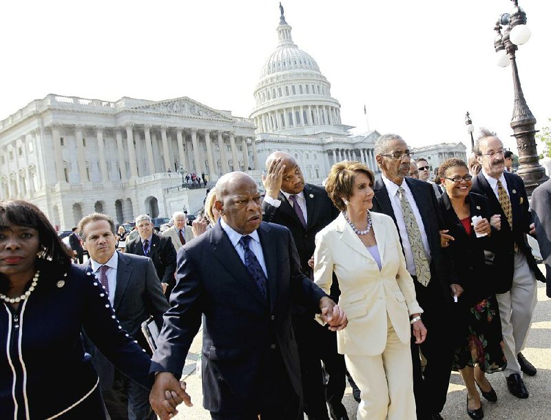 Rep. John Lewis of Georgia (left), House Minority Leader Nancy Pelosi and other Democratic House members leave the Capitol to boycott the contempt-of-Congress vote Thursday. 