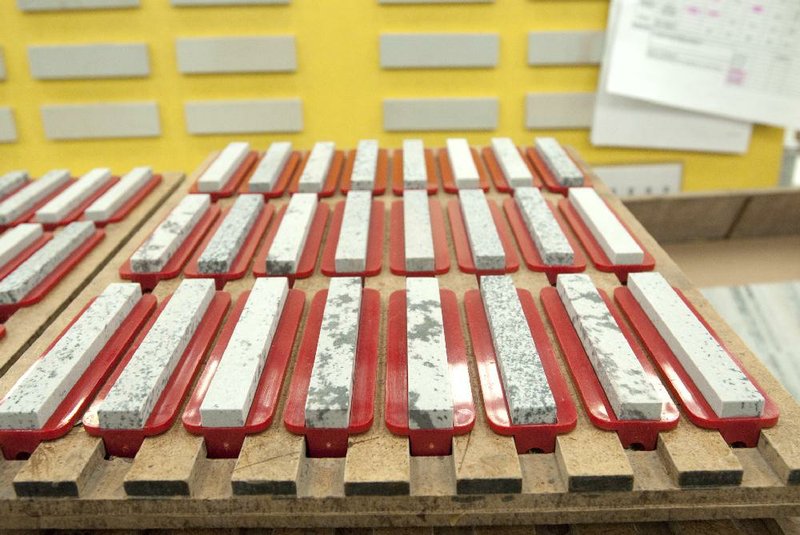Knife sharpening kits made of Arkansas stone, or novaculite, await packaging at the Smith’s Consumer Products plant.

