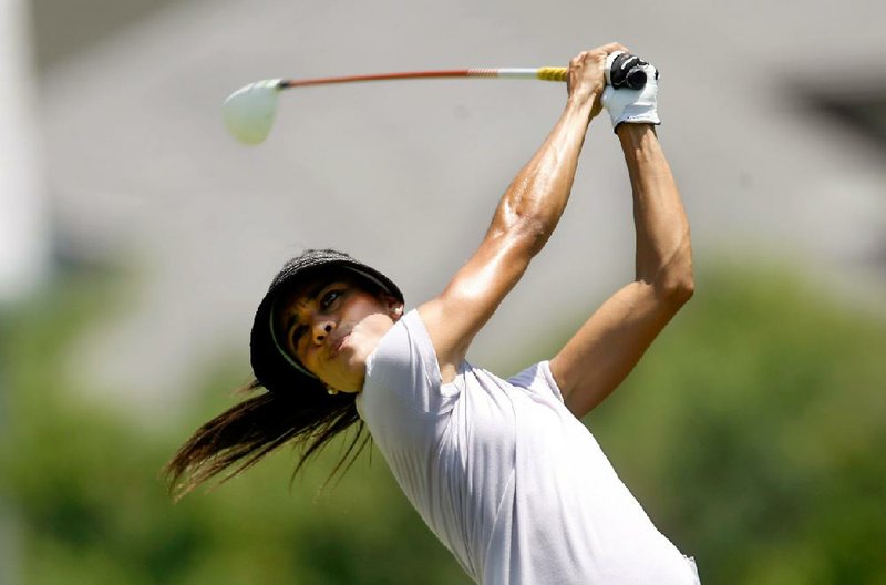 Veronica Felibert, who made the field of the LPGA NW Arkansas Championship as an alternate and had never shot an 18-hole score below 70, was five shots under that score Friday, joining 33 other golfers who were at or below 70 at Pinnacle Country Club in Rogers. 