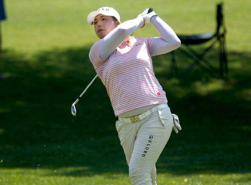 Chinese golfer Shanshan Feng, like most of the golfers who teed off in the afternoon, had to deal with temperatures over 100 degrees. Feng, who had a shot at the first-round lead, wilted late with two bogeys that left her in second place. 