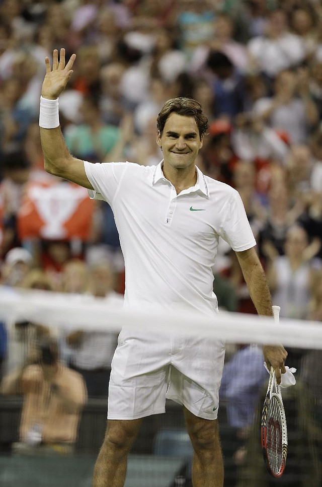 Roger Federer dropped the first two sets Friday against 29th-seeded Julien Benneteau of France, then was two points away from losing six times before coming back Friday to pull out a 4-6, 6-7 (3), 6-2, 7-6 (6), 6-1 victory in the third round in Wimbledon, England. 