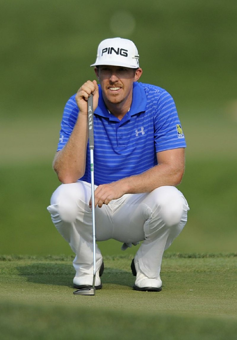 Hunter Mahan made seven birdies Friday in the stifling heat for a 6-under-par 65, giving him a two-shot lead in the AT&T National at Congressional Country Club in Bethesda, Md. 