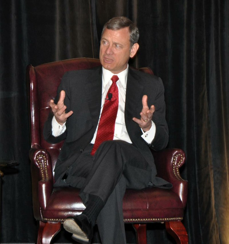 Chief Justice John Roberts of the U.S. Supreme Court participates in a program Friday in Farmington, Pa., that is part of the Science and the Law program by the Judicial Conference of the District of Columbia Circuit, in this photo provided by the U.S. Courts Circuit Executive’s Office. 