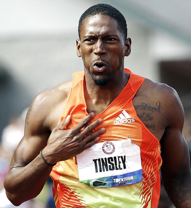 Michael Tinsley won the men’s 400-meter hurdles Sunday at the U.S. Olympic Track and Field Trials in Eugene, Ore., in 48.33 seconds and qualified for his first Olympics. 