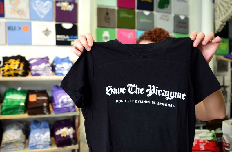 “Save The Picayune” shirts sold at the Fleurty Girl shop on New Orleans’ Magazine Street express a feeling shared by many loyal newspaper readers. 