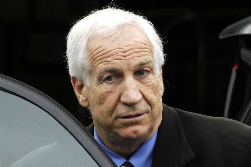 FILE - In this June 18, 2012 file photo, former Penn State University assistant football coach Jerry Sandusky leaves the Centre County Courthouse in Bellefonte, Pa.  Hall of Fame coach Joe Paterno and other senior Penn State  officials "concealed critical facts" about Jerry Sandusky's child abuse because they were worried about bad publicity, according to an internal investigation into the scandal released Thursday July 12, 2012. (AP Photo/Gene J. Puskar, File)