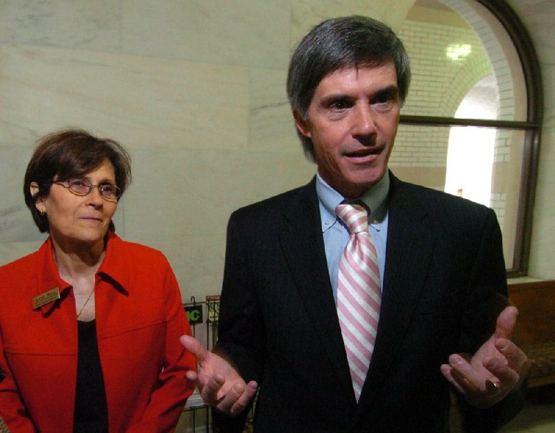 FILE - The co-chairmen of the Joint Budget Committee, state Rep. Kathy Webb and state Sen. Gilbert Baker announce that a compromise has been worked out on the state tax cuts in this March 17, 2011 file photo.