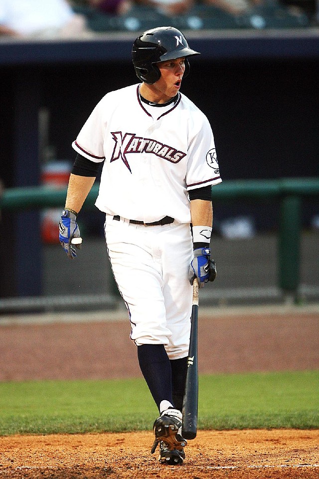 Arkansas Democrat-Gazette/WILLIAM MOORE
Naturals' Brian Fletcher knocks dirt off his cleats while at bat against Corpus Christi Friday, July 6, 2012 at Arvest Ballpark in Springdale.