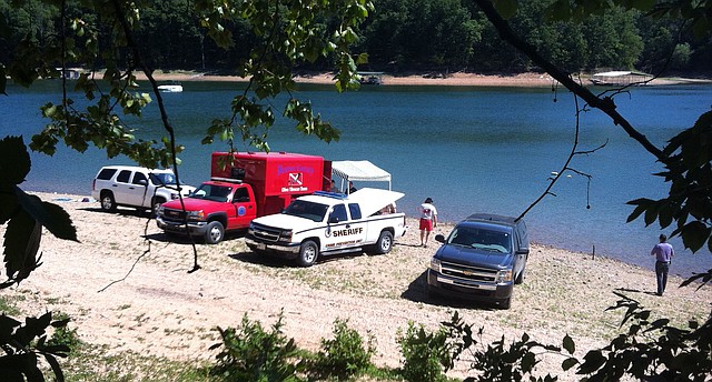 File photo: The Benton County Dive Team and the county coroner at Beaver Lake, where a man is believed to have drowned.
