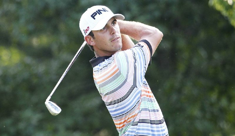 Billy Horschel watches his drive from the second hole of the third round of the True South Classic on Saturday. He only finished nine holes Saturday before play was suspended because of darkness. He is at 14 under par and is tied with Heath Slocum and Jason Bohn for second place. 