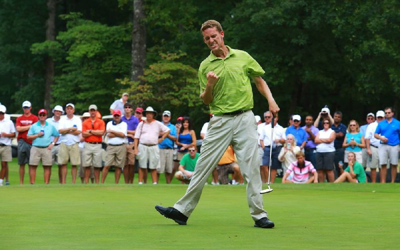 Peter Williamson reacts after making a 25-foot birdie putt on the third hole of a sudden-death playoff with Bobby Wyatt Saturday at Chenal Country Club’s Bear Den course. Williamson clinched his victory in the106th Southern Amateur Championship moments later when Wyatt’s birdie attempt missed its mark. 