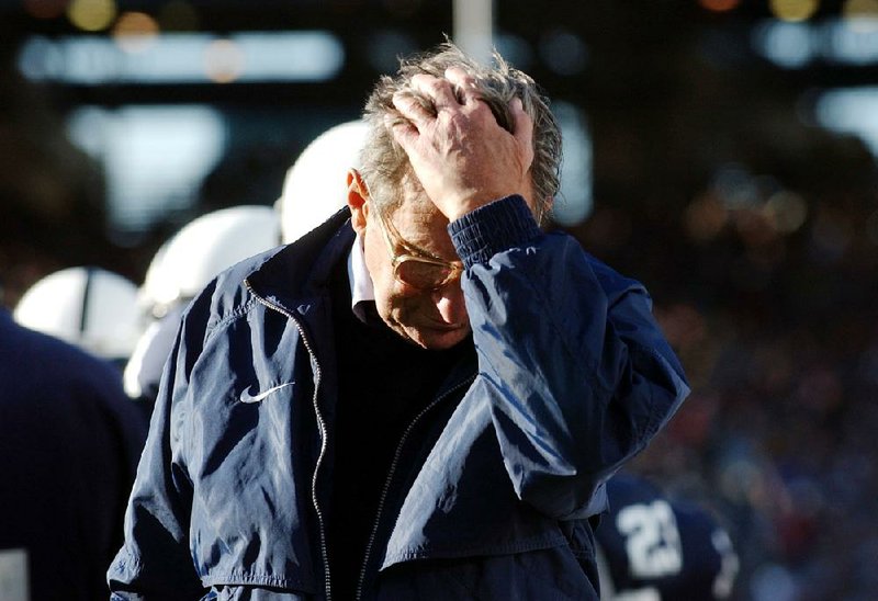 The NCAA has slammed Penn State with an unprecedented series of penalties, including a $60 million fine and the loss of all coach Joe Paterno's (shown) victories from 1998-2011. 
