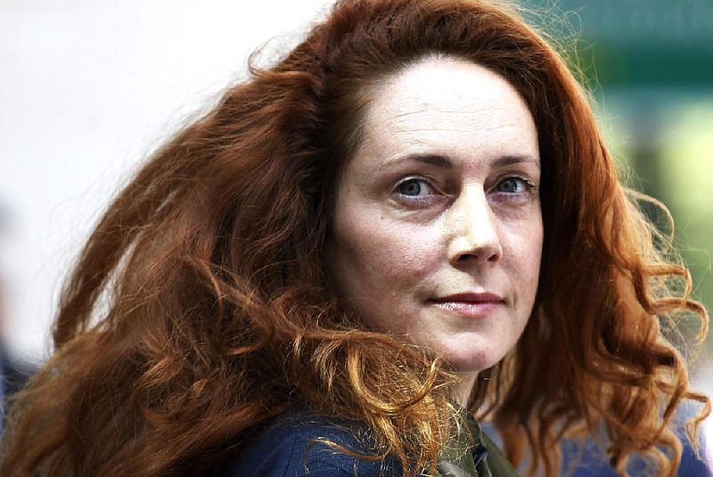 Rebekah Brooks said in a statement Tuesday that she neither authorized nor was aware of any phone hacking and promised to fight the charges. 