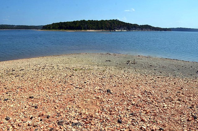 Lake levels at Beaver Lake, as seen Tuesday from a boat landing near the Arkansas 12 bridge, are about 7 feet below seasonal levels, according to the Army Corps of Engineers.