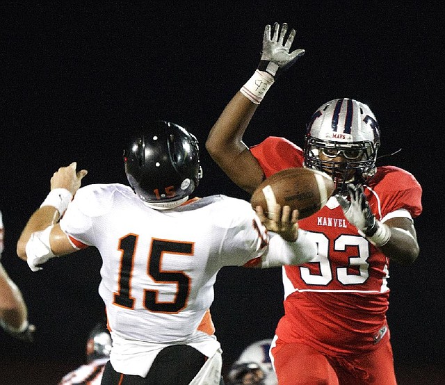 After suffering through shoulder injuries during his sophomore and junior seasons, Taiwan Johnson (right) of Manvel, Texas, had a healthy senior season and is ready for the challenges he will face this fall at Arkansas. 