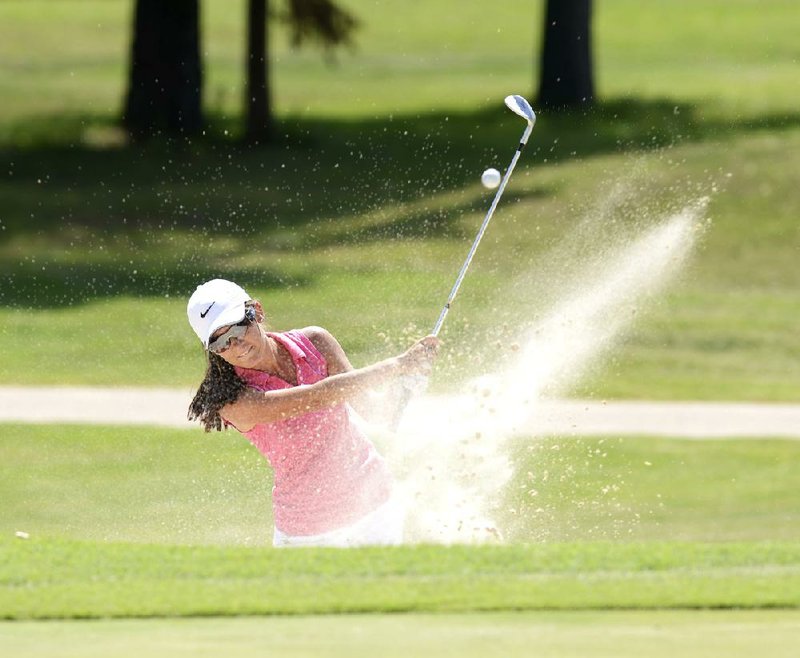 Kaylee Benton of Cabot hits out of a bunker Wednesday during the ASGA Girls Junior Match Play Championship at Eagle Hill Golf and Athletic Club in Little Rock. 