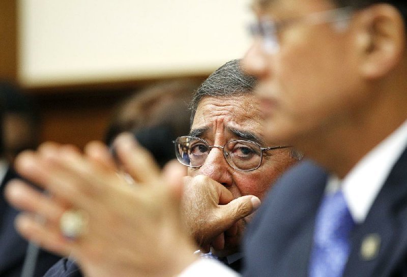 Defense Secretary Leon Panetta (left) sits with Veterans Affairs Secretary Eric Shinseki as he testifies Wednesday before the joint House Armed Services-Veterans Affairs committees on helping veterans return to civilian life. 