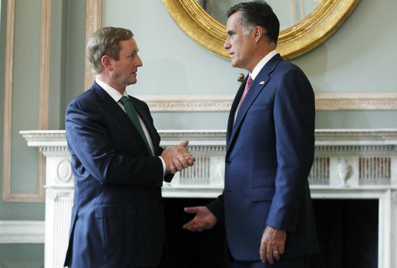 Republican presidential candidate former Massachusetts Gov. Mitt Romney meets with Ireland's Prime Minister Enda Kenny at the Embassy of Ireland in London on Friday, July 27, 2012. 