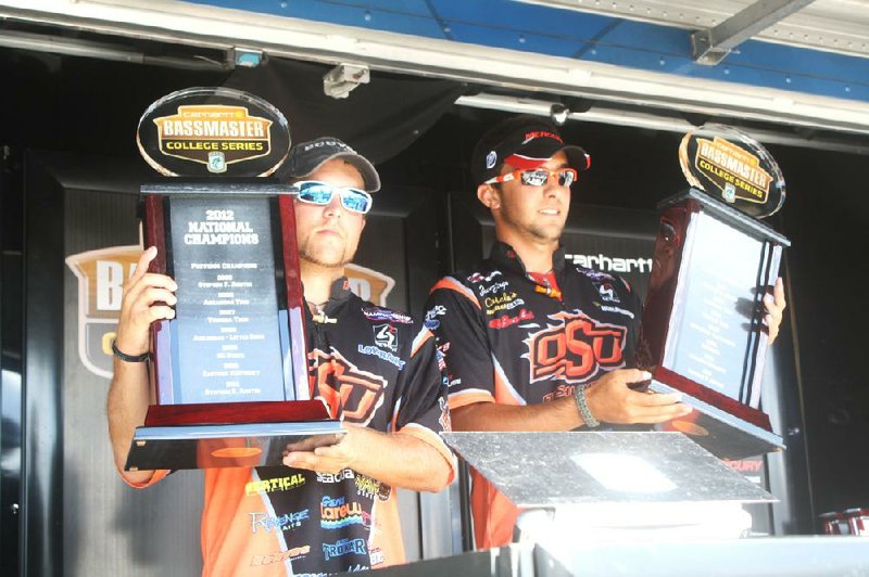 Oklahoma State teammates Blake Flurry (left) and Zack Birge overcame a dead fish, one in distress and an early exit to hold on for the Bassmaster College Series National Championship on Friday at Hurricane Lake in Benton. 